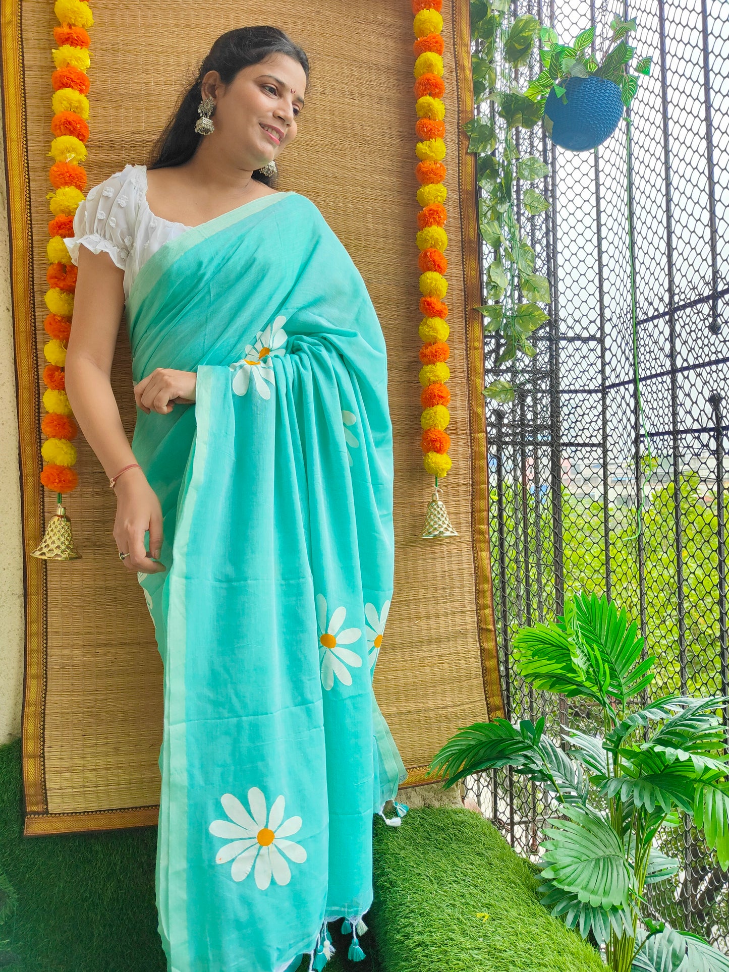 TURQUOISE BLUE FLORAL HAND PAINTED MUL COTTON SAREE