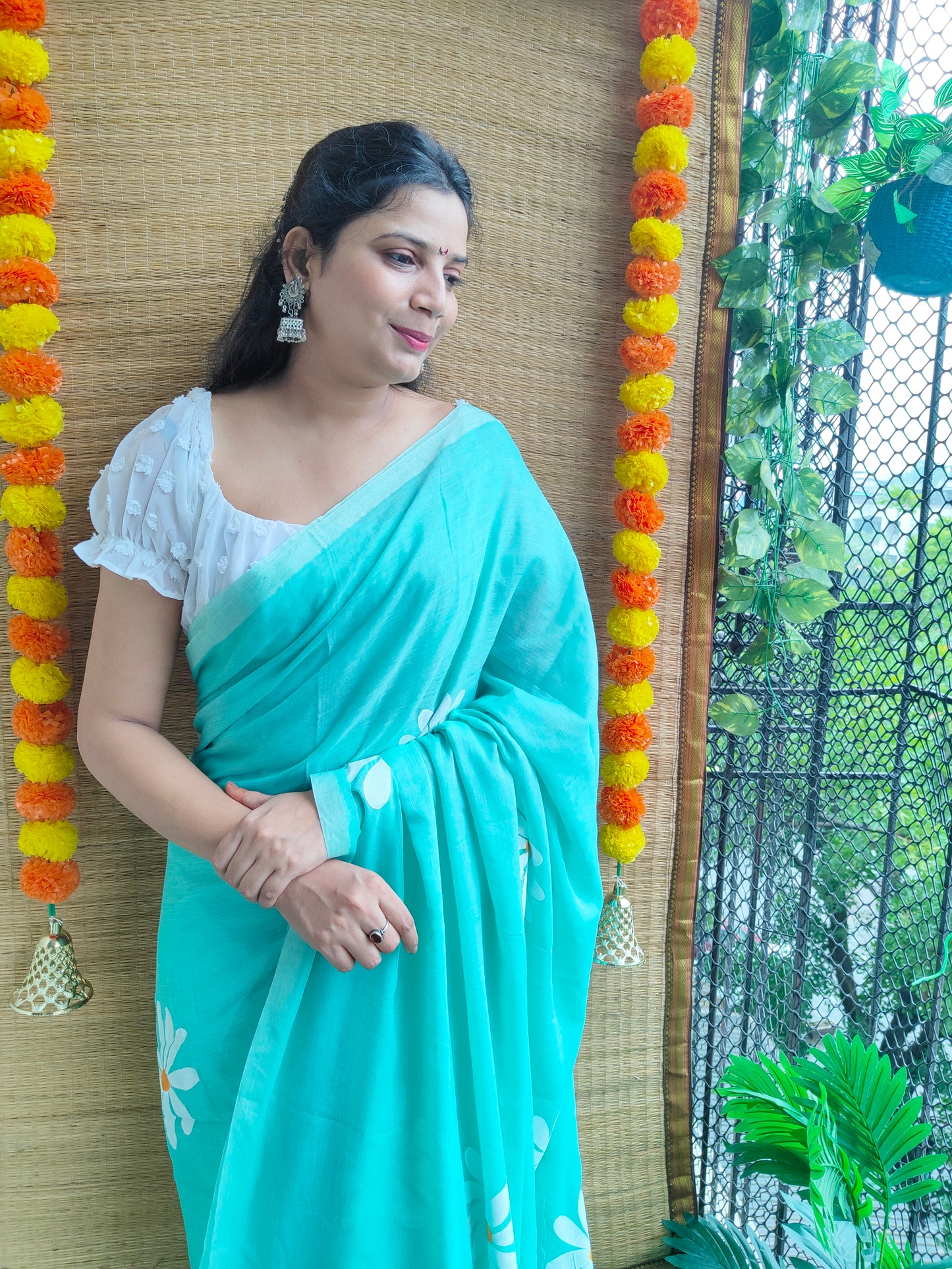TURQUOISE BLUE FLORAL HAND PAINTED MUL COTTON SAREE