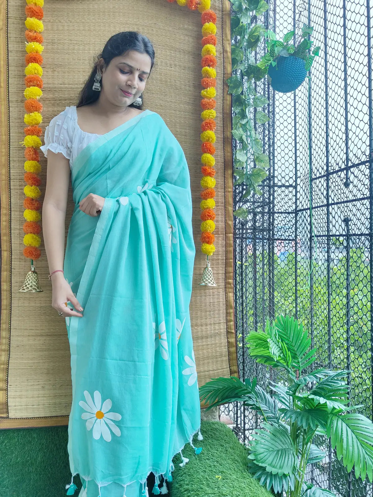 TURQUOISE BLUE FLORAL HAND PAINTED MUL COTTON SAREE